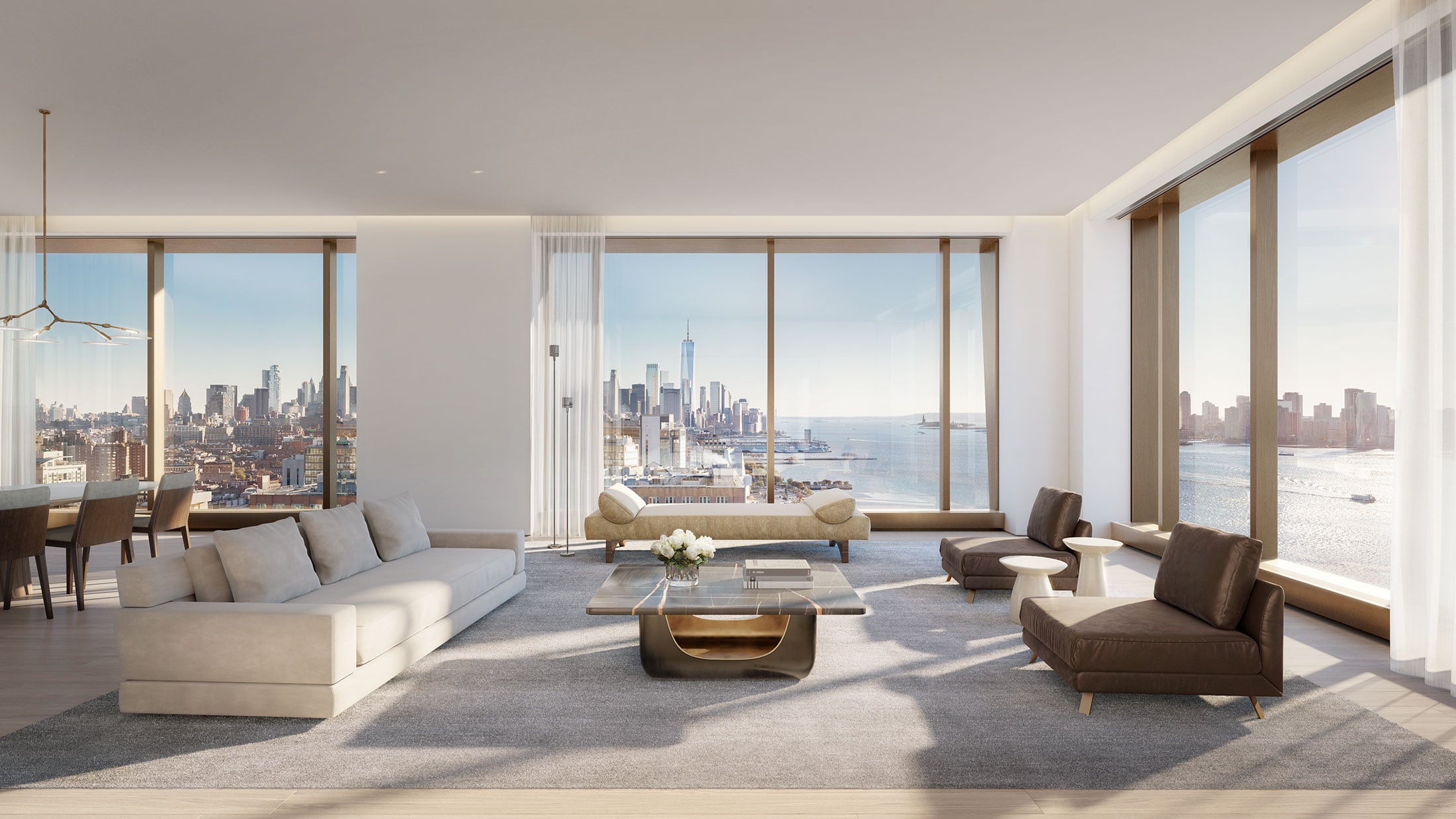 The I living room with seven inch wide plant oak wood floors and unparalleled views of the city and Hudson river.